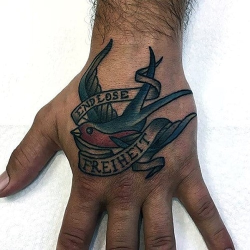 banner-swallow-mens-traditional-hand-tattoo-ideas