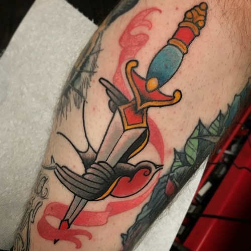 Dagger-and-swallow-tattoo