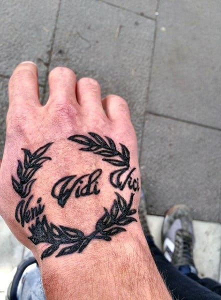 olive-branches-veni-vidi-vici-mens-hand-tattoos
